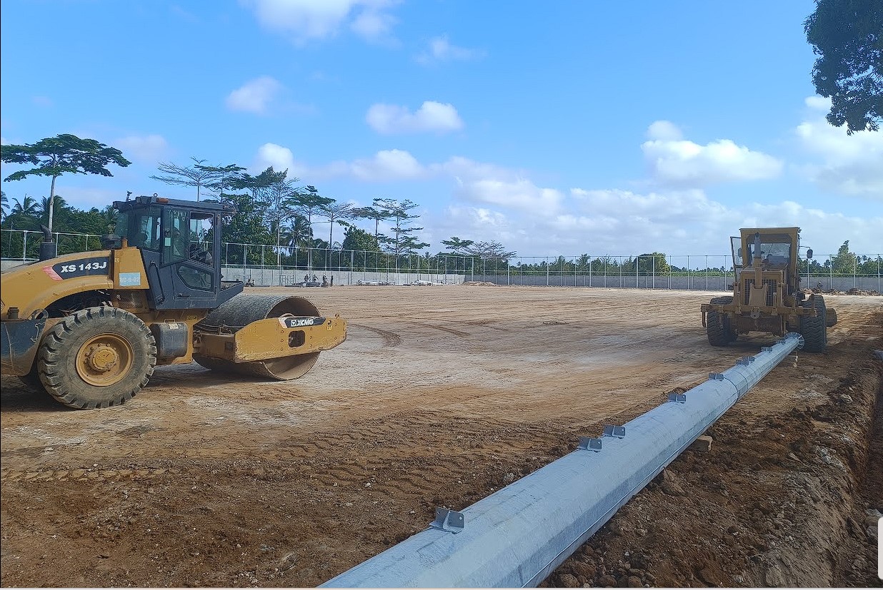 Grading the full-size pitch base