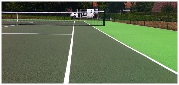 Finished hard court with net and boundary lines