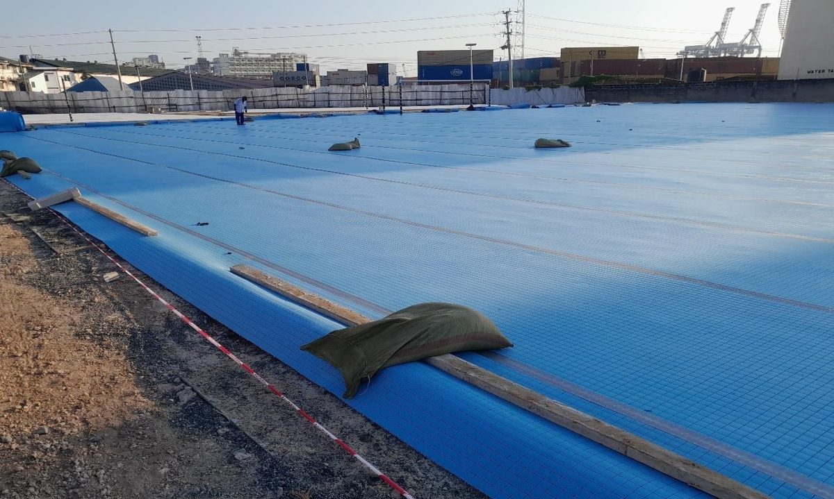 Shock pad laid across the pitch base